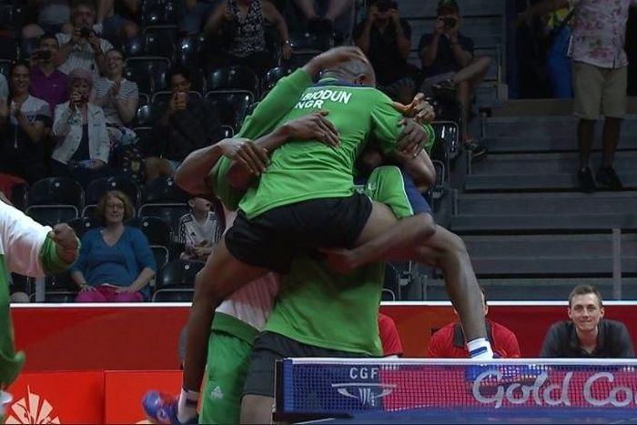 Nigeria table tennis team celebrating win over England at 2018 Commonwealth Games