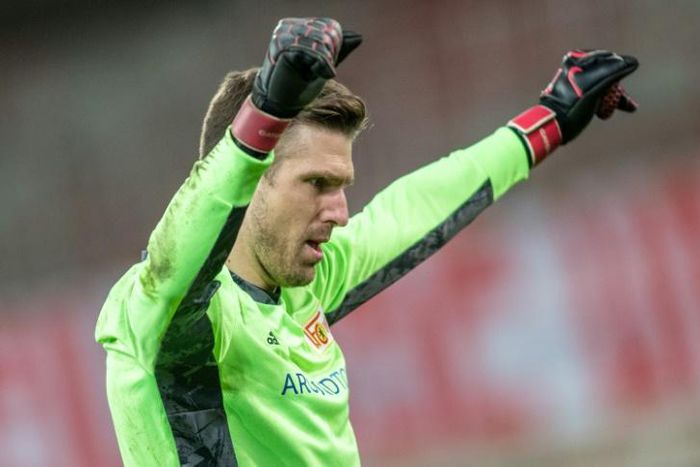 Union Berlin goalkeeper Andreas Luthe celebrates after Friday's home win over Bayer Leverkusen