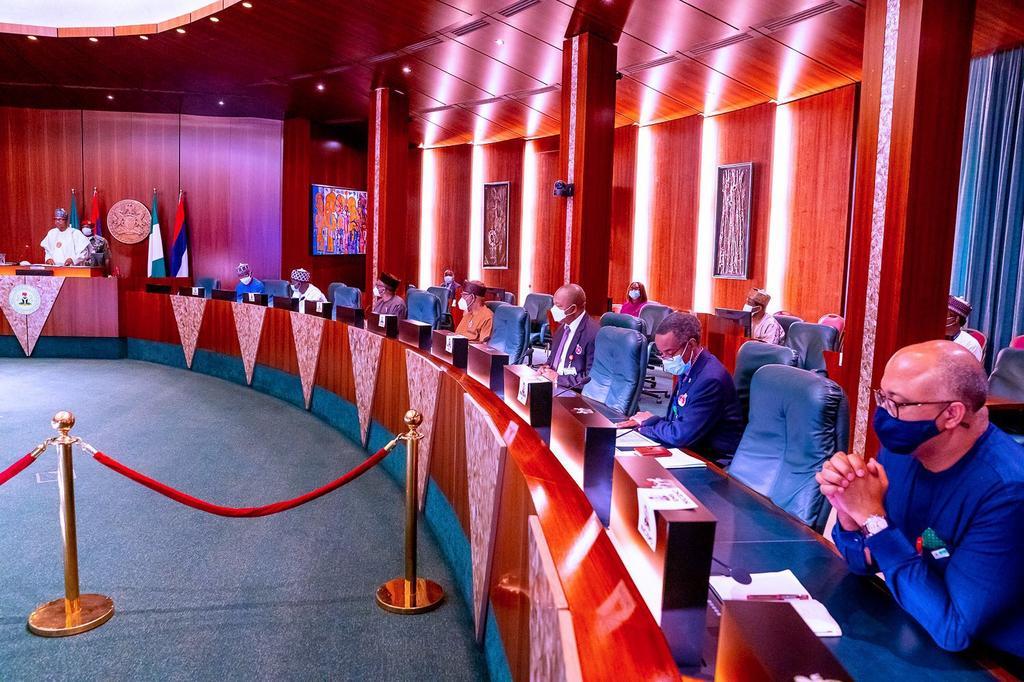 President Muhammadu Buhari at the State House, Abuja, received the Presidential Task Force on COVID19’s End of Year report from members of the Task Force led by SGF, Boss Mustapha. [Twitter/@BashirAhmaad]