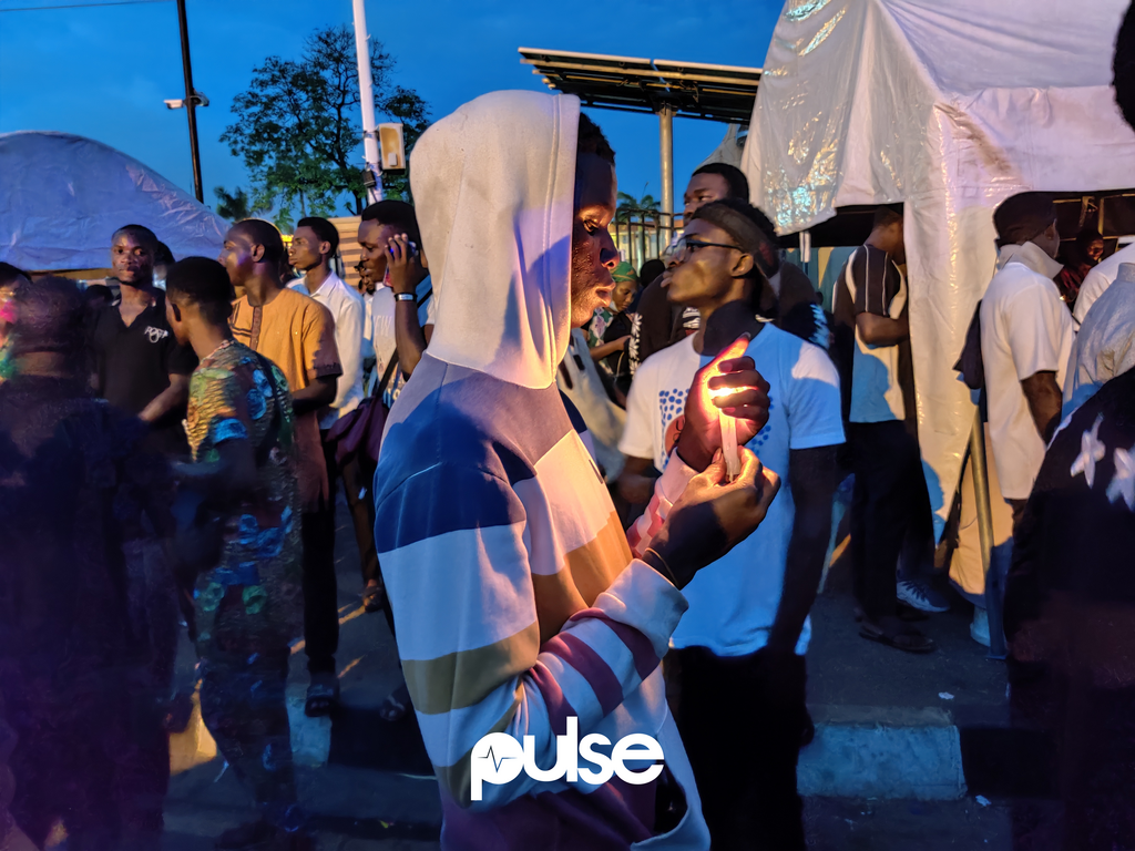 #EndSARS protesters in Alausa, Lagos observe candle light ceremony for victims of police brutality on Friday, October 16, 2020