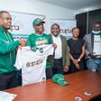 L-R: Charles Dungor, Chief Marketing Officer of Soloti Gaming Limited holding a Jersey with the Chief Frapster, Reminisce