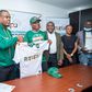L-R: Charles Dungor, Chief Marketing Officer of Soloti Gaming Limited holding a Jersey with the Chief Frapster, Reminisce