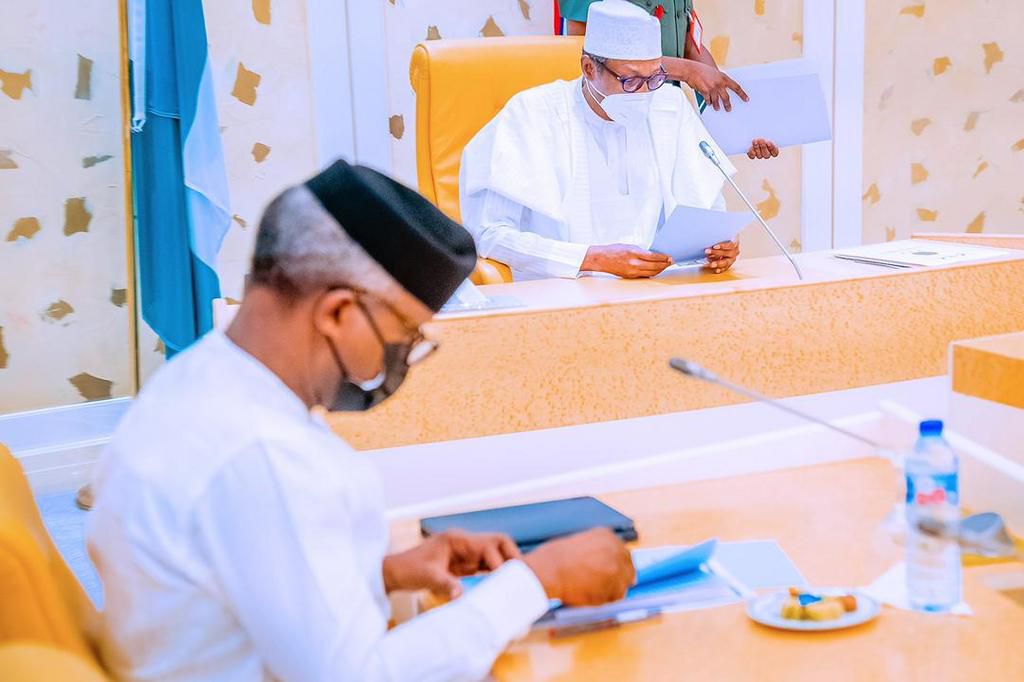 President Buhari and VP Osinbajo engage in security discussions at the State House Abuja on April 30, 2021 (Tolani Alli)