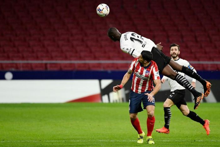 Racially abused: Valencia's French star Mouctar Diakhaby pictured playing against Atletico Madrid in January