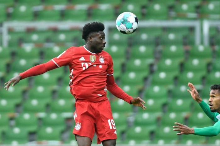 Bayern Munich star Alphonso Davies (L) has been made a UN ambassador  to help refugees
