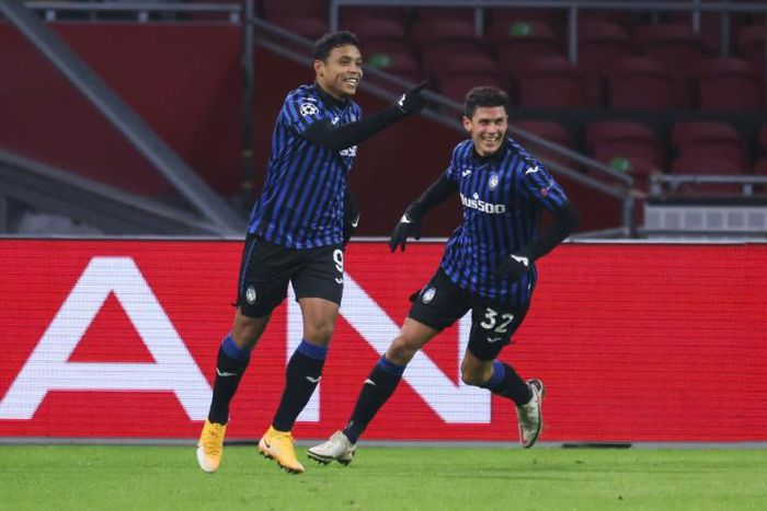 Atalanta's Colombian forward Luis Muriel (L) scored his 11th goal this season against Udinese.