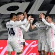 Real Madrid players celebrate after Karim Benzema's brilliant opening goal against Barcelona in the Clasico