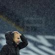 Pep Guardiola is soaked on the sidelines as Storm Bella battered the Etihad during Manchester City's win over Newcastle