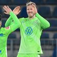 Two strikes: Wolfsburg midfielder Renato Steffen (left) celebrates scoring