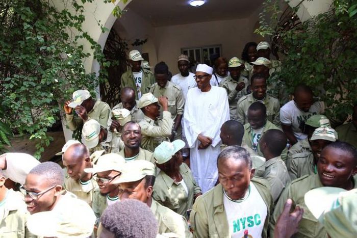 President Muhammadu Buhari with corps members [Presidency]