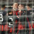 Luka Jovic (2R) celebrates after scoring Eintracht Frankfurt's winning goal on Sunday