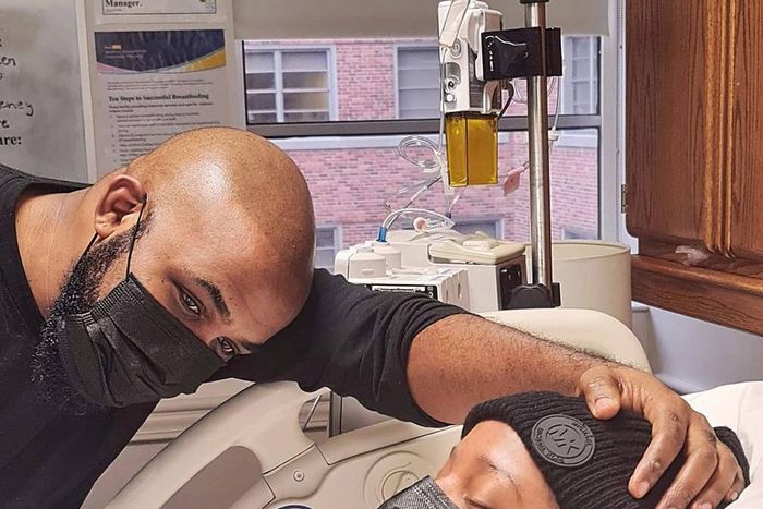 Pic 4 : Papa staring at Zaiah in amazement. A few minutes after he was born. I was EXHAUSTED. [Instagram/AdesuaEtomi]