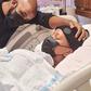 Pic 4 : Papa staring at Zaiah in amazement. A few minutes after he was born. I was EXHAUSTED. [Instagram/AdesuaEtomi]