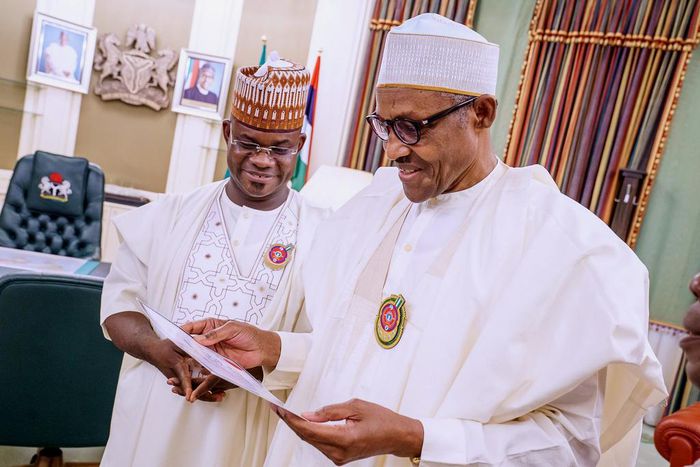 The re-elected Governor of Kogi, Yahaya Bello presented his Certificate of Return to President Muhammadu Buhari. [Twitter/@BashirAhmaad]