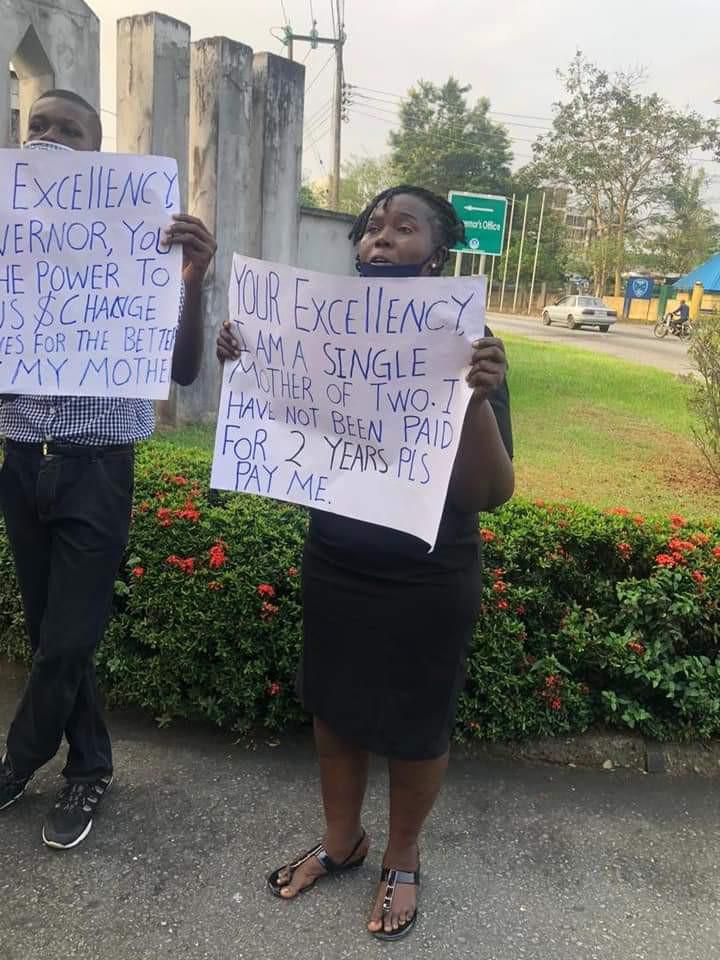 Nigerian magistrate & 2 sons protest over her 2 years' salary arrears