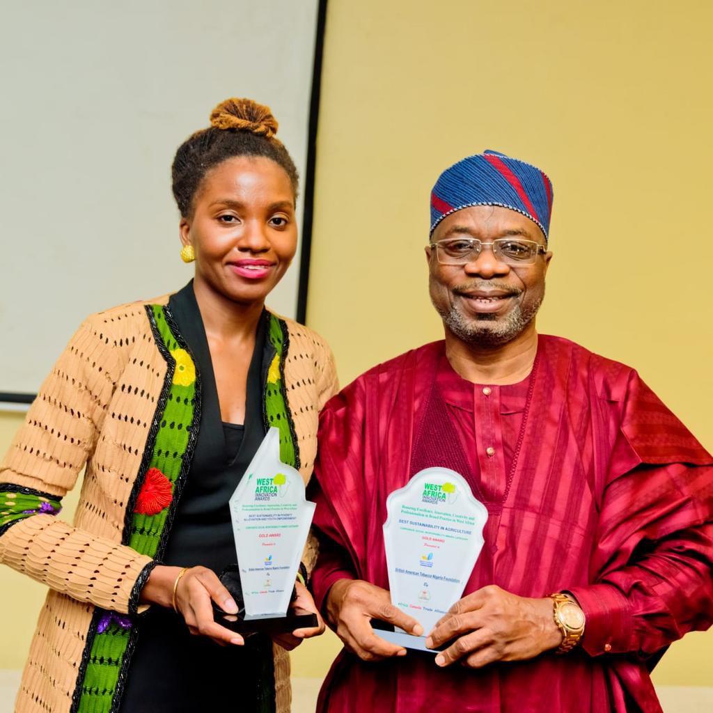 General Manager, BATNF, Ololade Johnson; and Technical Committee Member, BATNF, Mr Fatai Afolabi, displaying the awards won by BATN Foundation