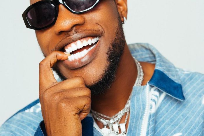 Damilola Afolabi  known professionally as L.A.X is a Nigerian recording artist. [Instagram/IzzLax]