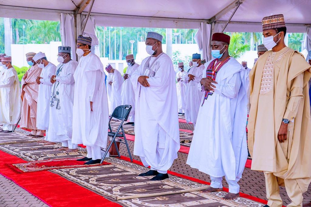 In the photo: President Muhammadu Buhari; president of the Senate, Ahmad Lawan, Speaker, House of Representatives, Femi Gbajabiamila and other Muslim faithful observe Eid prayer at Aso Villa. [Presidency]