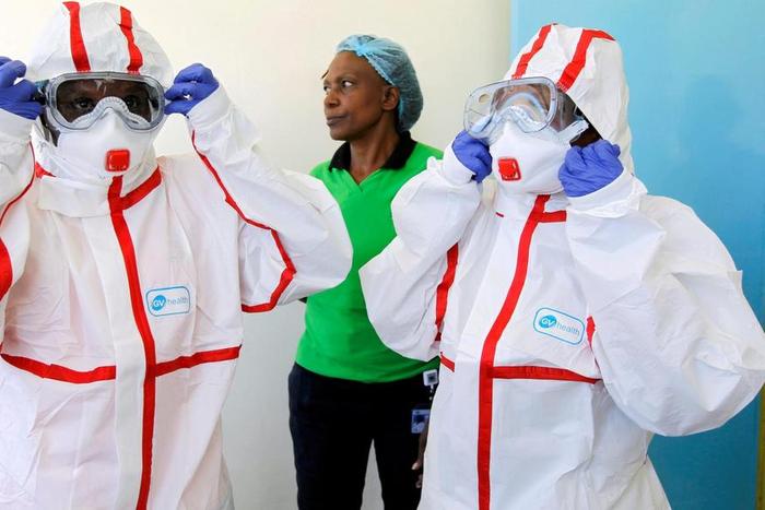 Kenyan medics during a demonstration of preparations for any potential coronavirus cases at the Mbagathi Hospital, isolation centre for the disease, in Nairobi