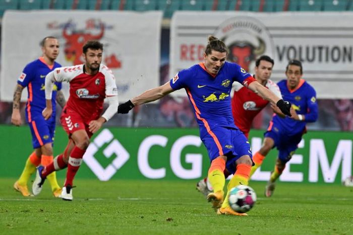 Marcel Sabitzer converts the penalty which sealed RB Leipzig's 2-0 home win over Freiburg on Saturday