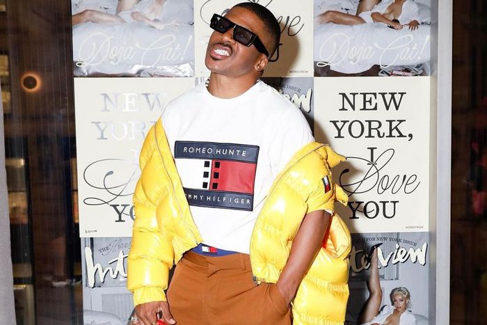 Romeo Hunte wearing his collection with Tommy Hilfiger