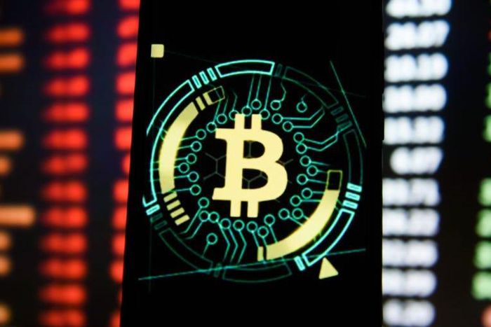 Bitcoin logo is seen displayed on an Android mobile phone