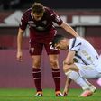 Torino defender Mergim Vojvoda (C) comforts Juventus' Cristiano Ronaldo after a 2-2 stalemate.