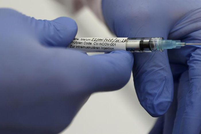 FILE PHOTO: Professor Gottfried Kremsner injects a vaccination against the coronavirus disease (COVID-19) from German biotechnology company CureVac