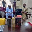 James Manager kneels before James Ibori (SaharaReporters)