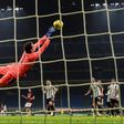 Wojciech Szczesny deflects a shot as Juventus ended AC Milan's unbeaten run stretching back to March.