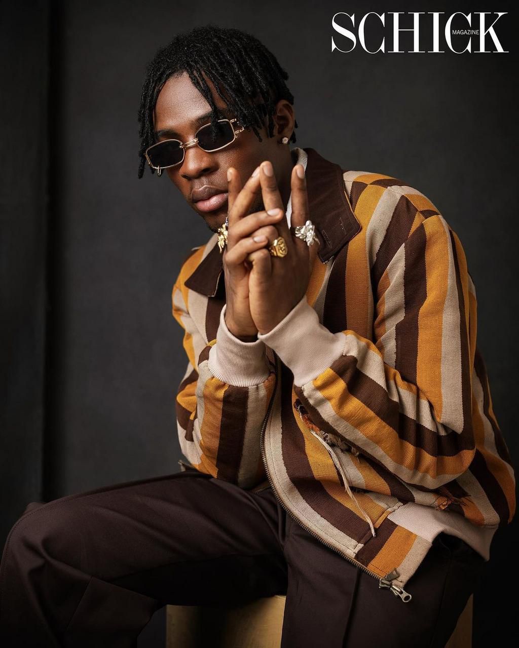 Joeboy in an outfit sewn by Yomi Afolabi