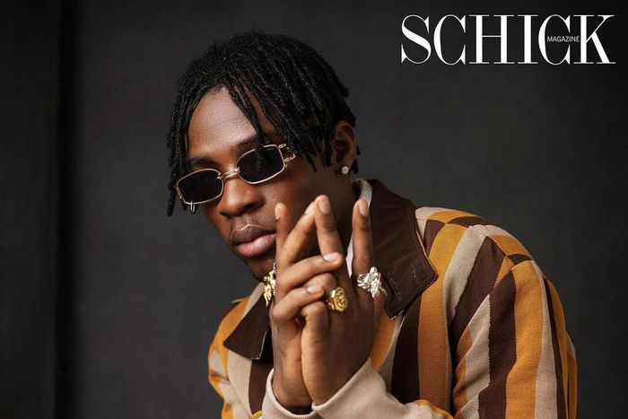 Joeboy in an outfit sewn by Yomi Afolabi