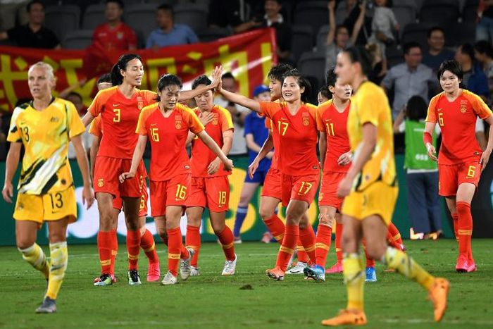 China's players celebrate scoring against Australia during the women's Olympic football tournament in Sydney in February last year. Now more than a year later they have the chance to complete their quest for an Olympic place when they face South Korea