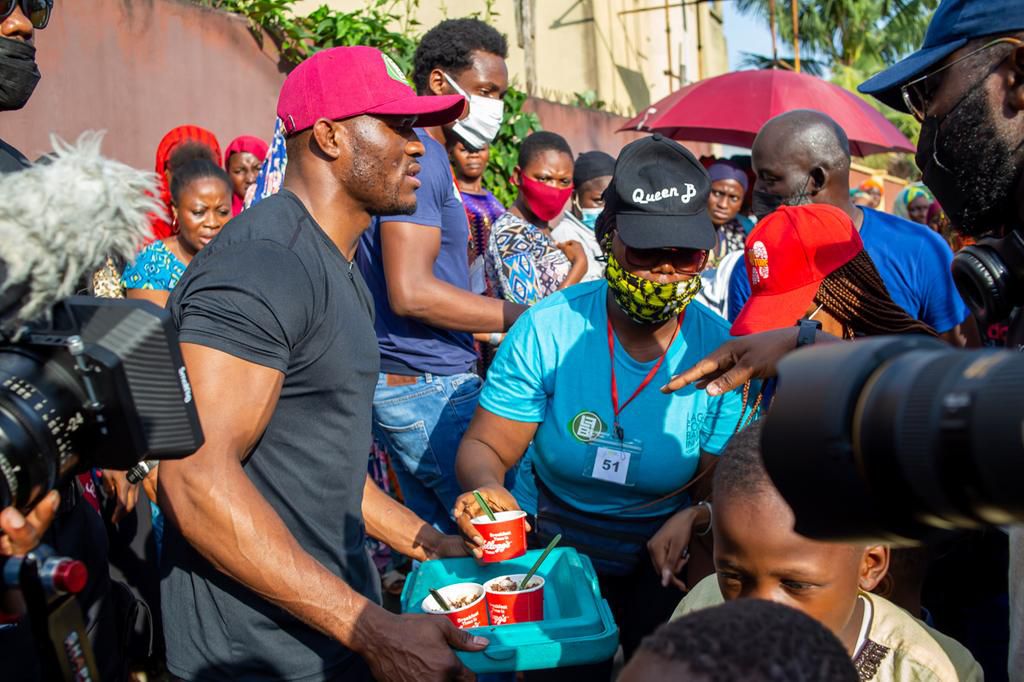 Champion and family man, Kamaru Usman shares an unforgettable CSR experience, feeds 1000 children