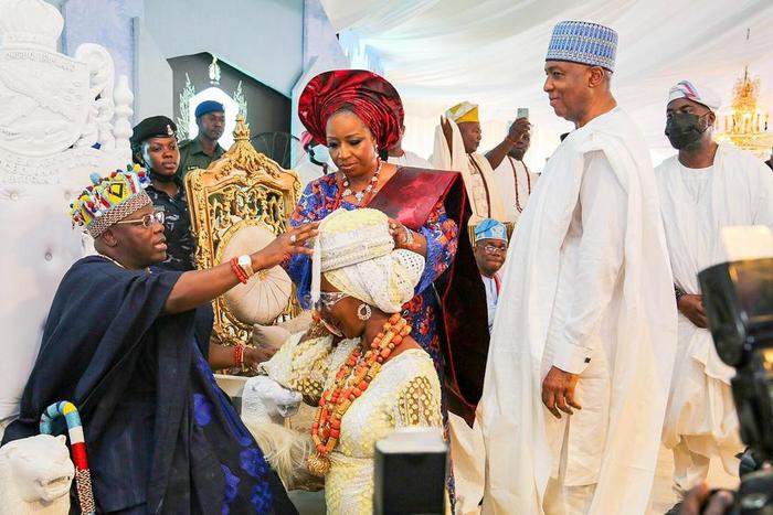 L-R: Former Senate President, Dr Bukola Saraki, Mrs Toyin Saraki and The Oniru of Iruland, Lagos, Oba Omogbolahan Lawal and Olori Mariam Lawal, during the conferment of chieftaincy title on Mrs Saraki in Lagos on Thursday. [NAN PHOTO]