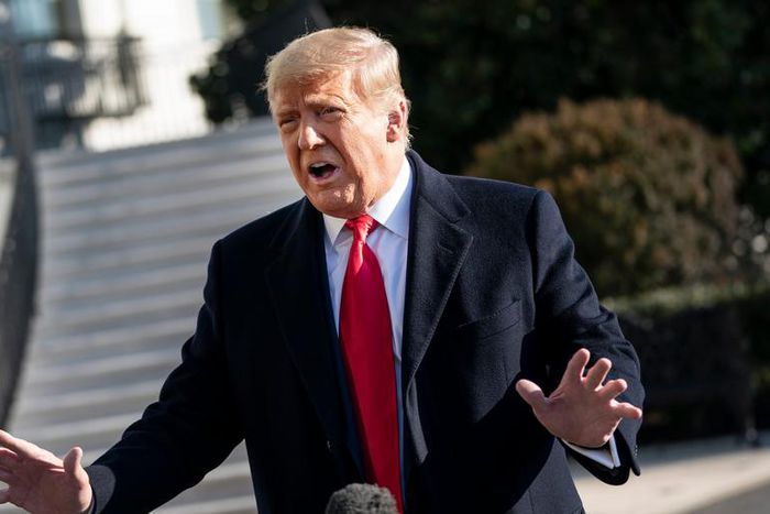 President Donald Trump speaks to reporters on the South Lawn of the White House before boarding Marine One on January 12, 2021 in Washington, DC.