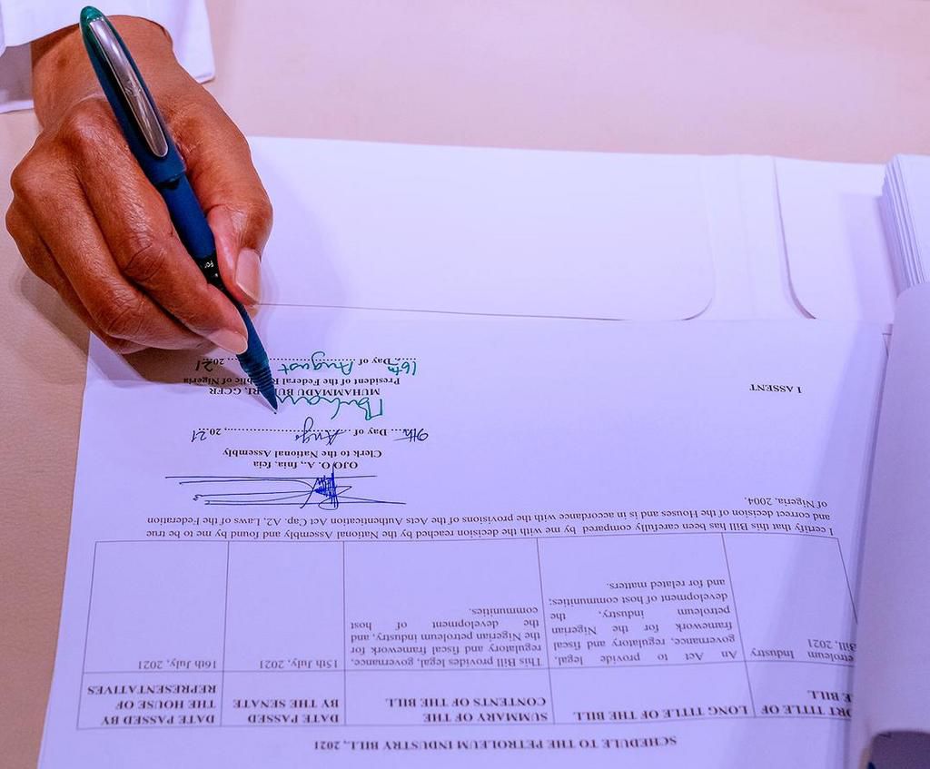 President Buhari signs PIB into law on August 16, 2021 (Femi Adesina)