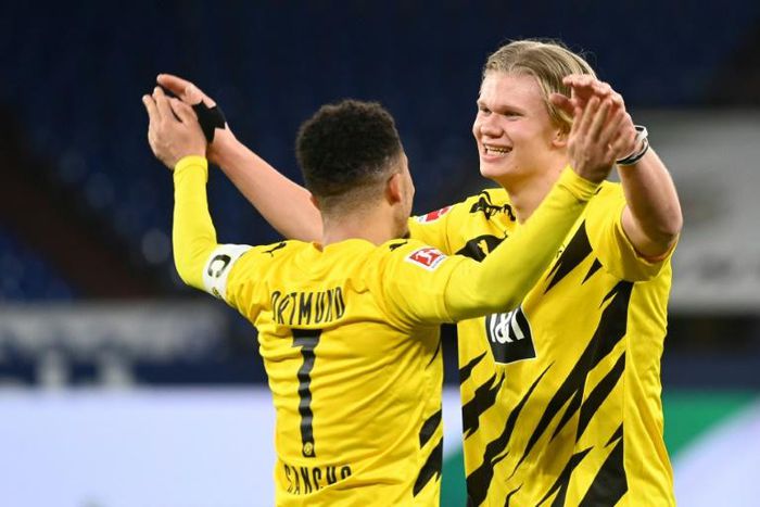 Striker Erling Braut Haaland (R) and England winger Jadon Sancho both scored in Dortmund's derby win on Saturday