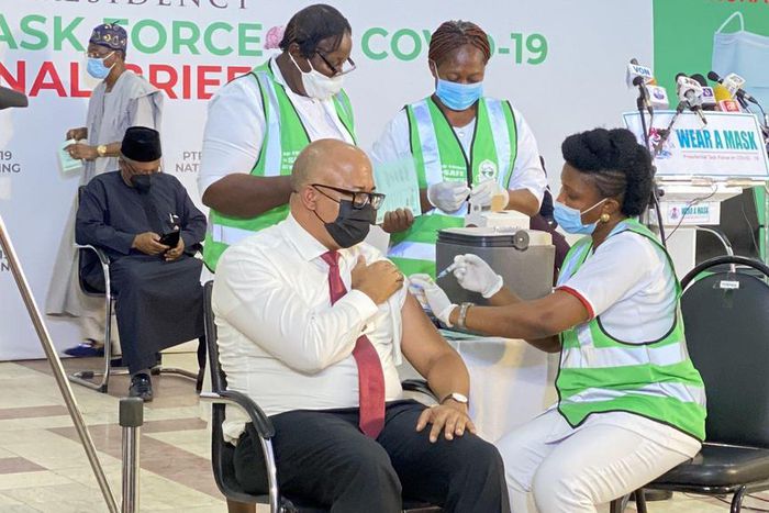 Director General of Nigerian Centre for Disease Control, Chikwe Ihekweazu receives COVID-19 vaccine shot. [Twitter/@NphcdaNG]