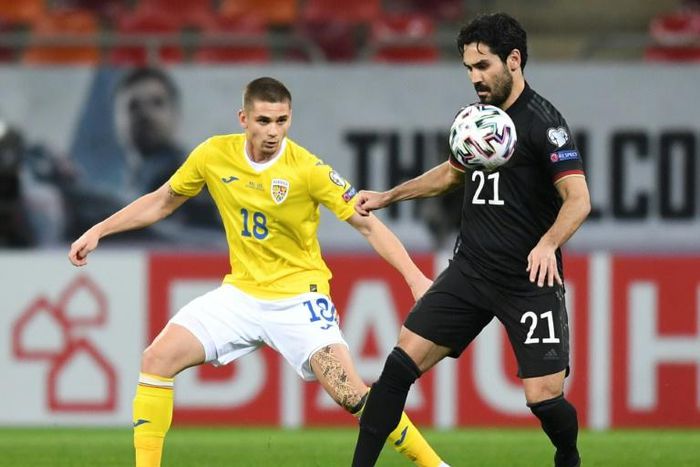 Ilkay Gundogan (R) is set to captain Germany against North Macedonia on Wednesday in a World Cup qualifier