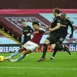 Aston Villa striker Ollie Watkins scores against Arsenal