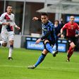 Argentina forward Lautaro Martinez (L) scored three goals in Inter Milan's first game of 2021.