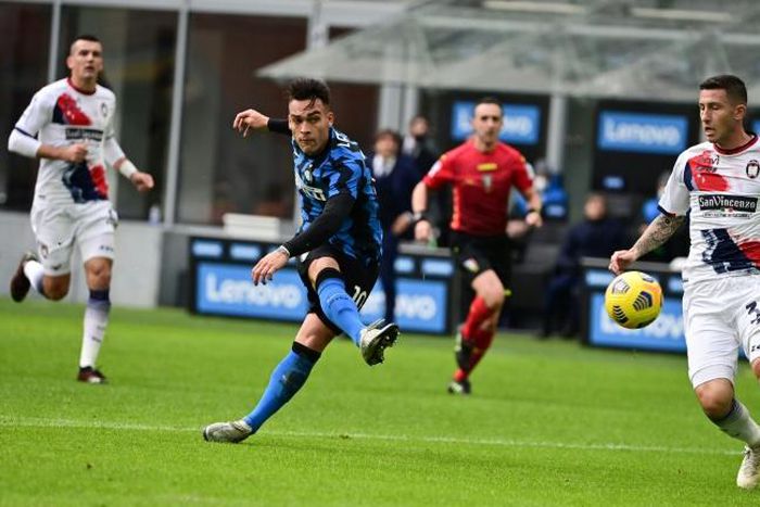 Argentina forward Lautaro Martinez (L) scored three goals in Inter Milan's first game of 2021.