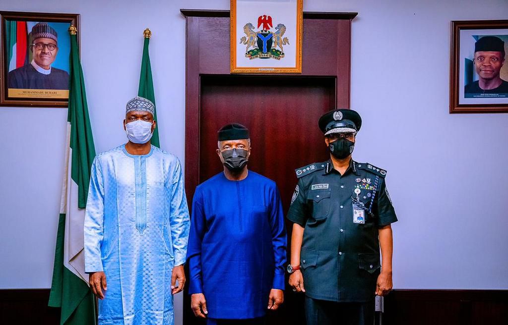 Vice President Osinbajo decorates new acting IGP Usman Baba at the State House Abuja on Wednesday April 7, 2021 (Tolani Alli)