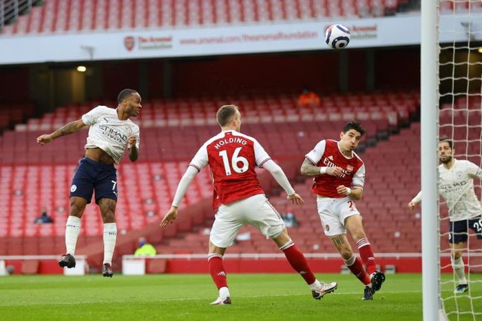 Manchester City forward Raheem Sterling scores at Arsenal