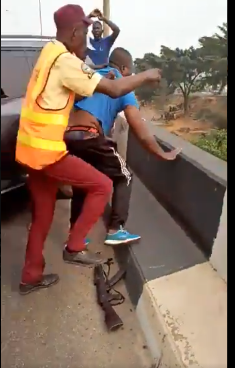 Driver knocks police officer from a bridge into the ditch below