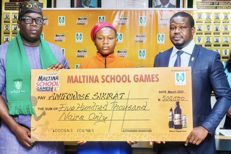 L-R Dr Obafunsho Usman, Treasurer Nigeria School Sport Federation  Anifowose Sikirat, Winner Best Athlete Junior Girls Category and Mr Hilson Mbara, Trade Marketing Execution Manager- Strategic Programs,  Nigerian