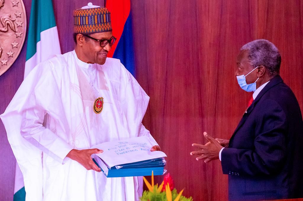 President Muhammadu Buhari (left) with Justice Ayo Salami (right) [Presidency]