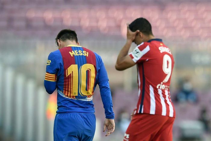 Luis Suarez (right) has urged his former Barcelona teammate Lionel Messi to remain in Catalonia