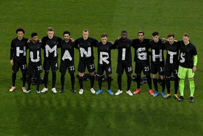 Germany's players pose for a group photo with the wording "Human rights" on their T-shirts prior to the their World Cup qualifier with Iceland